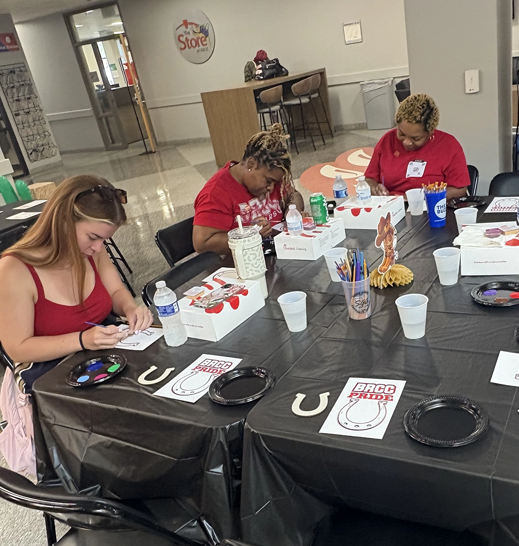 Students work on welcome Howdy project.