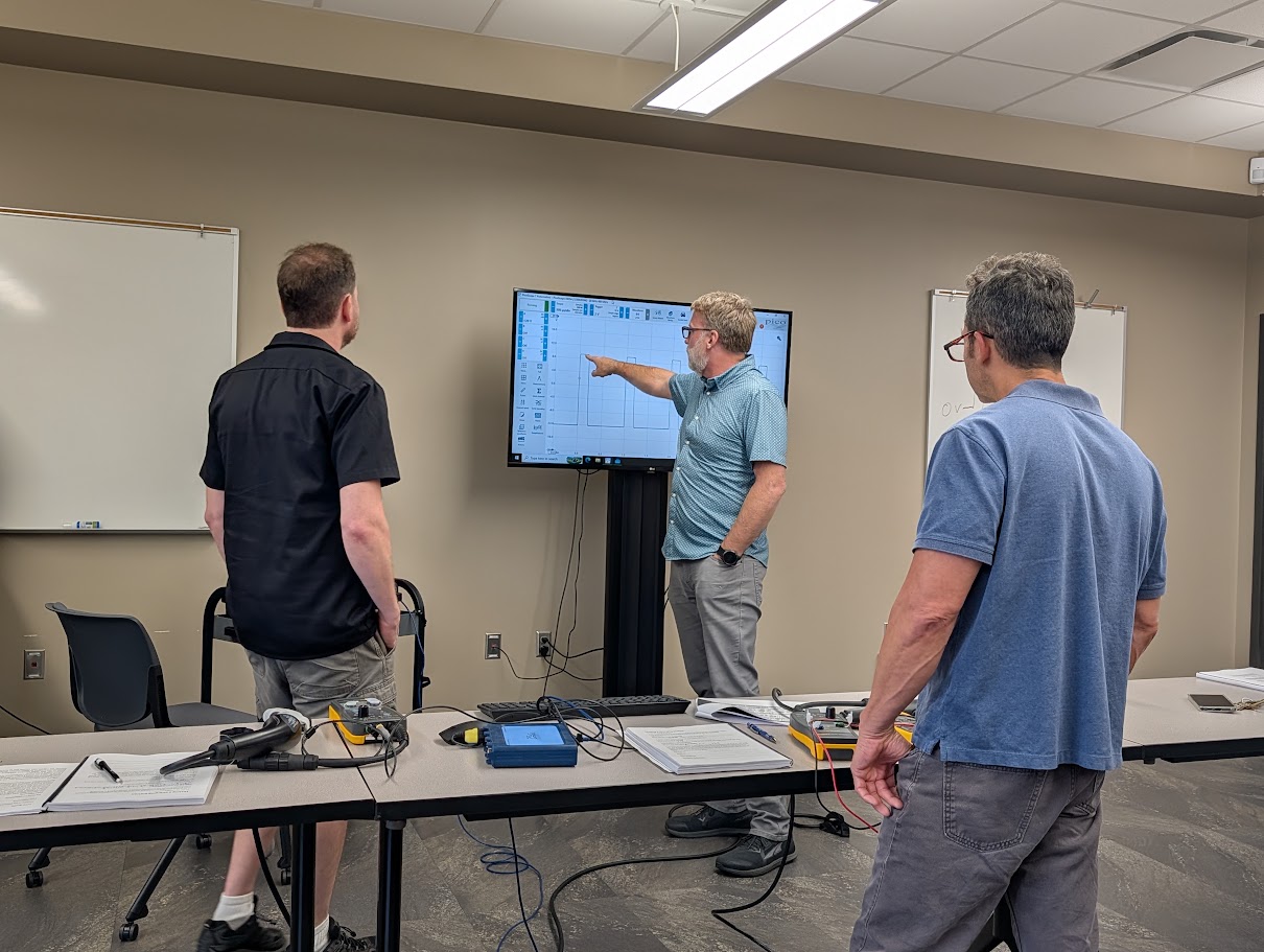 Reed Mundy teaching EVSE Technician students