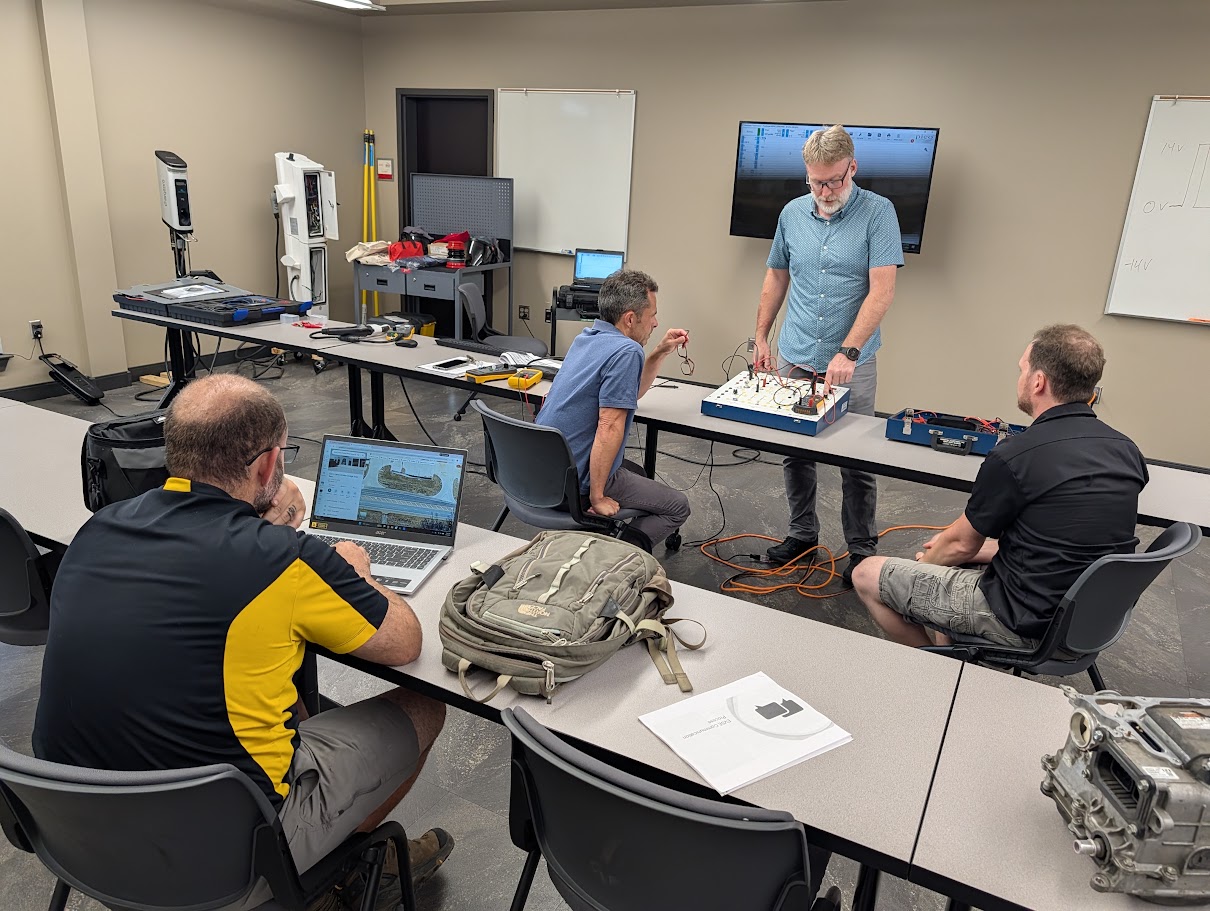 Reed Mundy and students in the EVSE Technician class