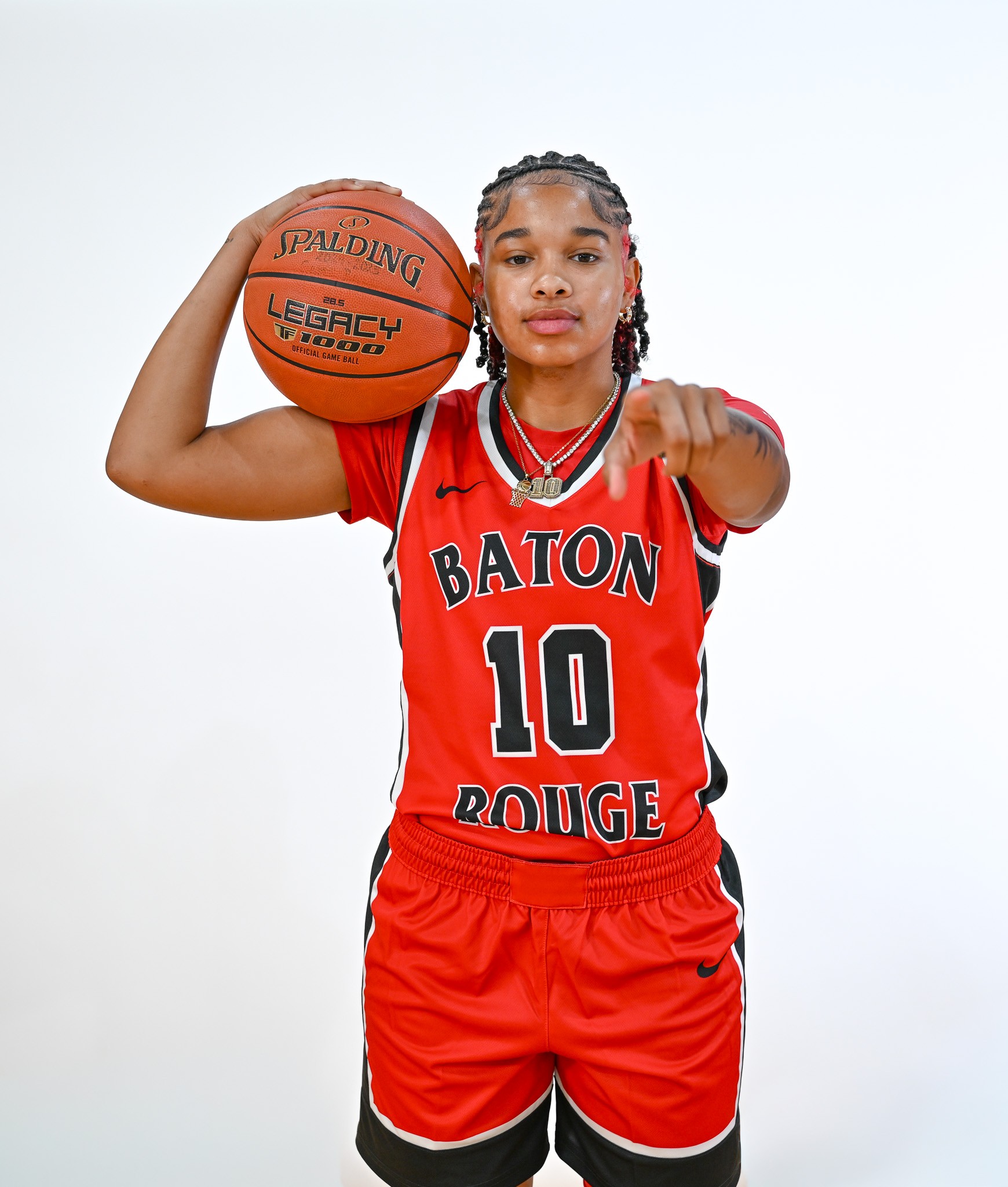 BRCC Women's Basketball player posing and pointing at the camera