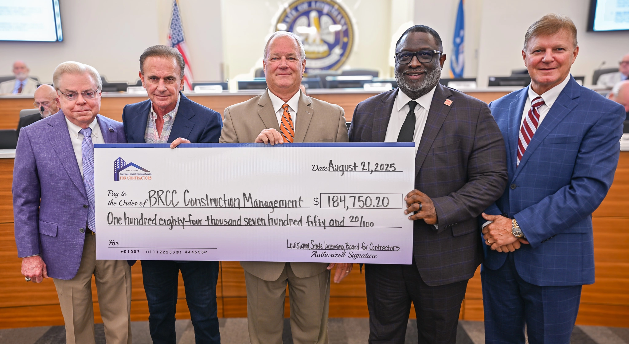 Donation check presentation from LSLBC to BRCC
