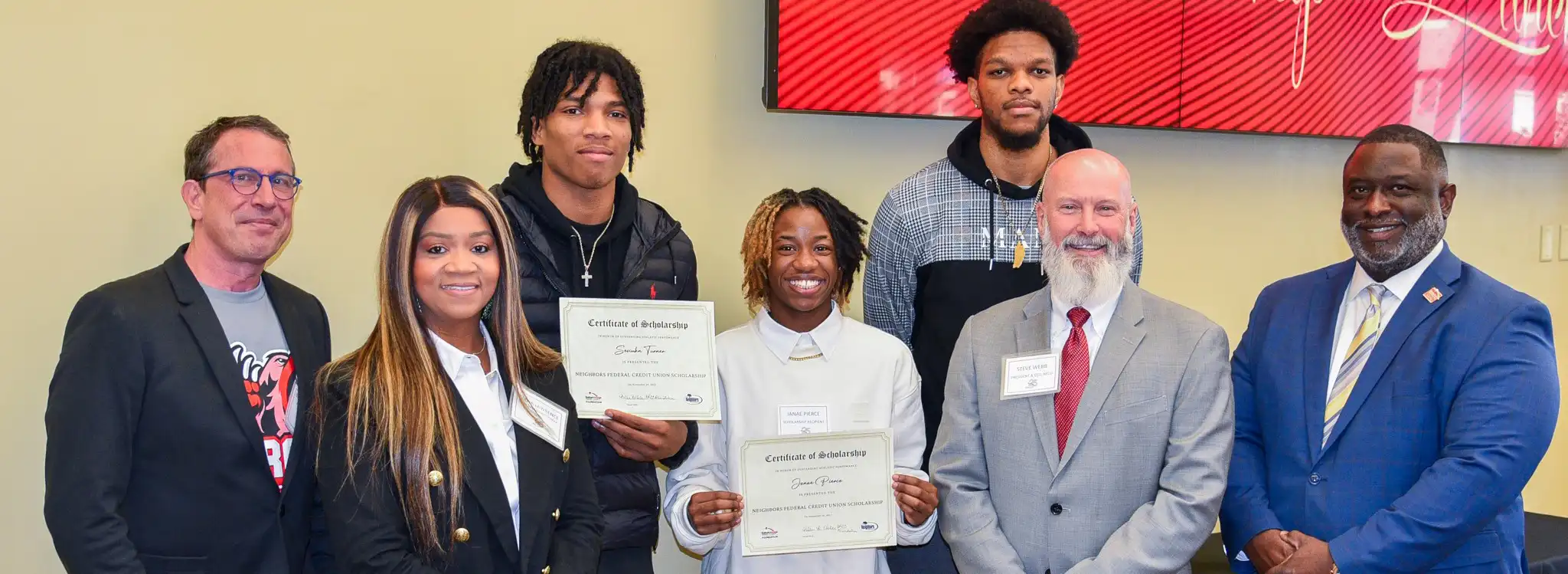 Neighbors Federal Credit Union Champions Student Success at Baton Rouge Community College with a $10,000 donation for scholarships. BRCC student-athletes were presented scholarships during a luncheon on Tuesday, Nov. 28. Pictured (l to r) are: BRCC Director of Athletics Brock Kantrow, Neighbors Federal Credit Union Chief Operations Officer Tanya York Lawrence, BRCC student Seviuhn Turner, BRCC student Janae Pierce, BRCC student Jacob Barry, Neighbors Federal Credit Union President and CEO Steve Webb, and BRCC Chancellor Dr. Willie E. Smith, Sr.